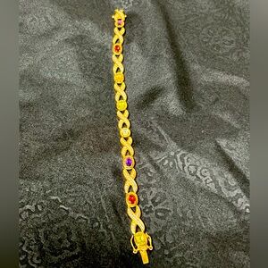 Gold toned gem bracelet